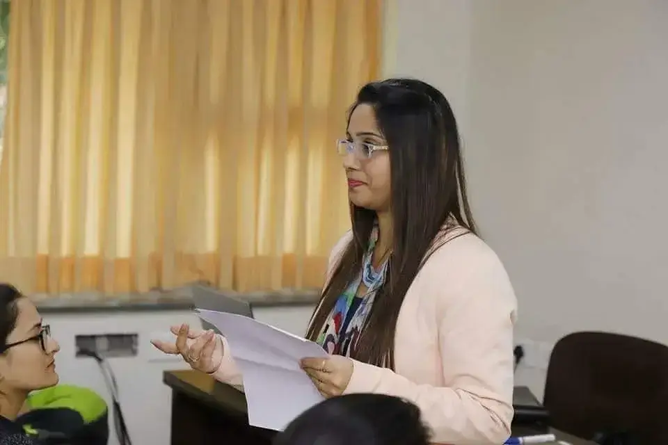 Richa Gandhi guiding a participant during a workshop