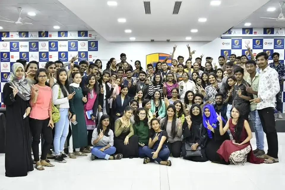Richa Gandhi with participants after a training event